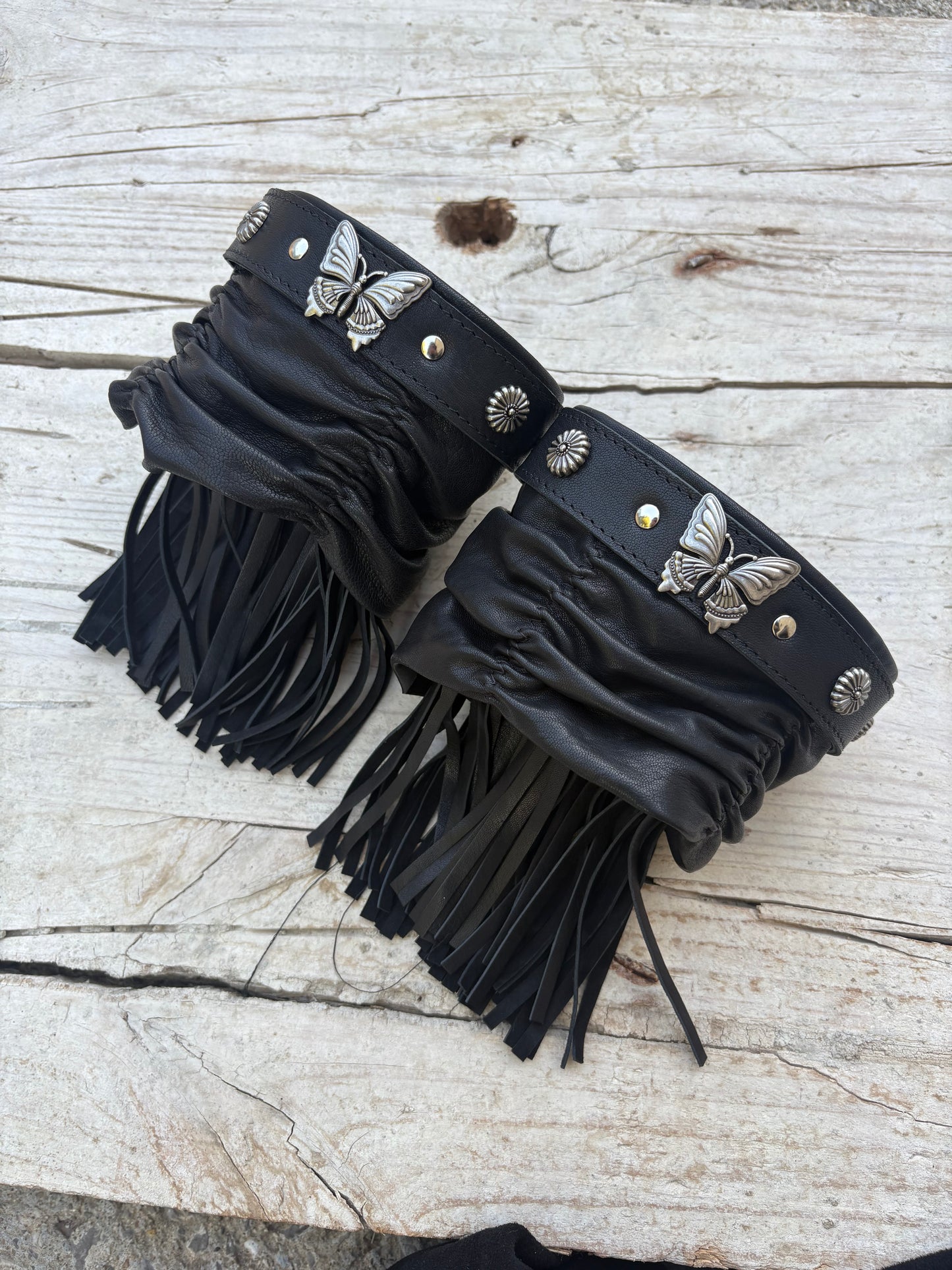 Cubrebotas de piel de cordero italiano